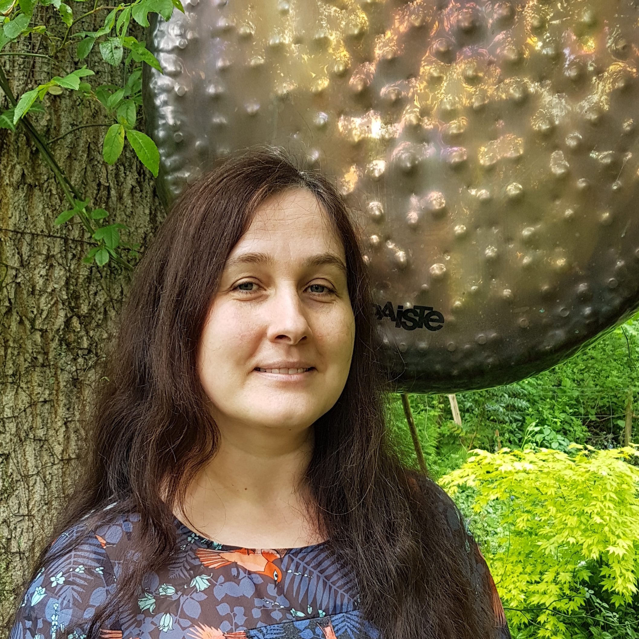 Masha in garden with Earth gong May 2019